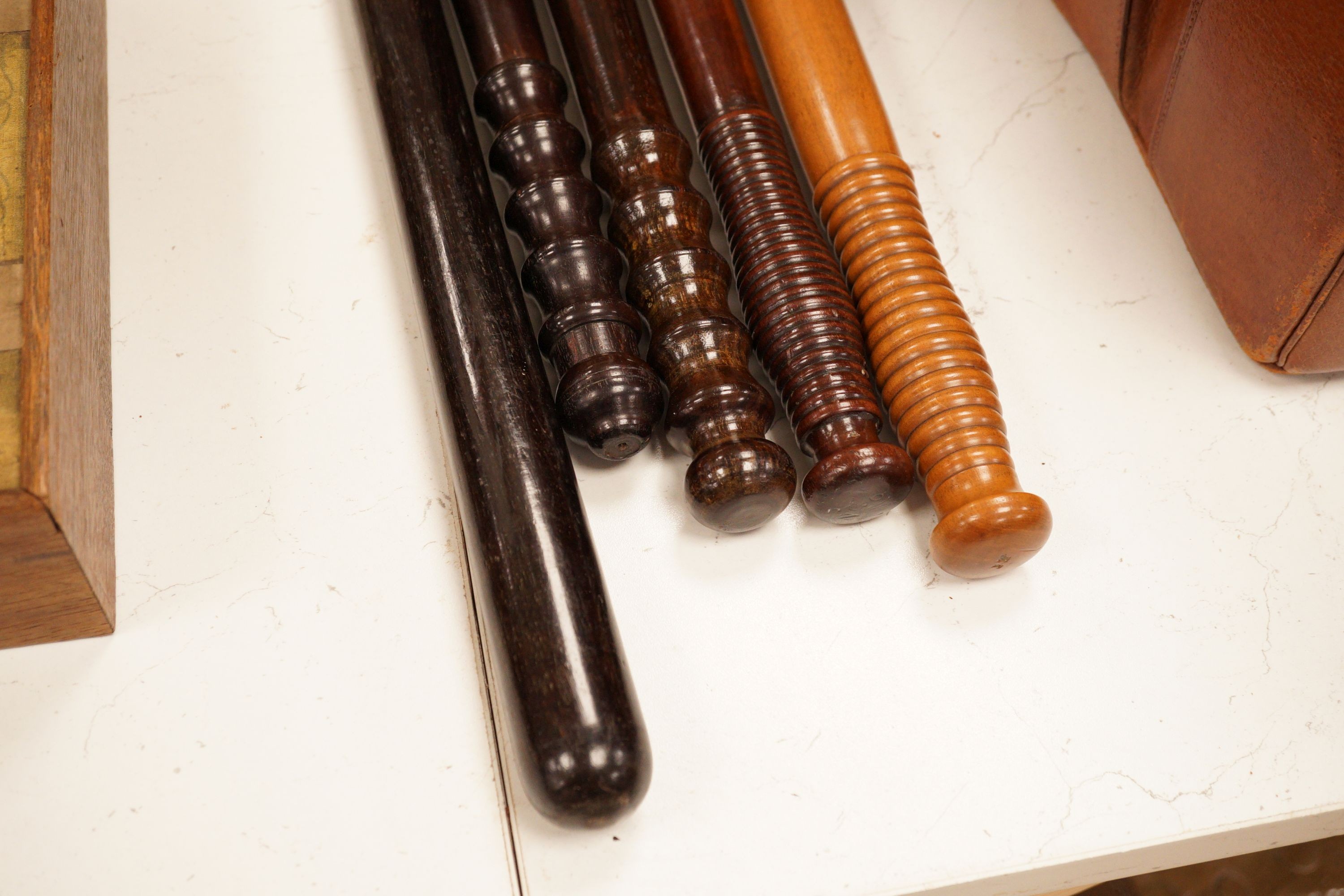 A collection of six assorted 19th century constabulary truncheons in varying woods